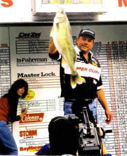 John Kolinski hoists a huge walleye at a PWT qualifier