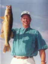 Perry Good hoists a fine specimen of a walleye