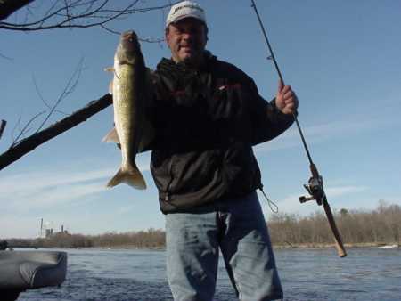 John holds a nice river walleye