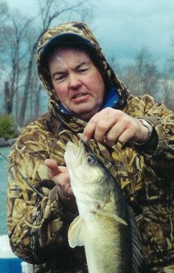 The author Ron anlauf with a first run tailrace walleye