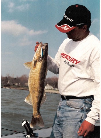 John Kolinski hoists up another fine walleye